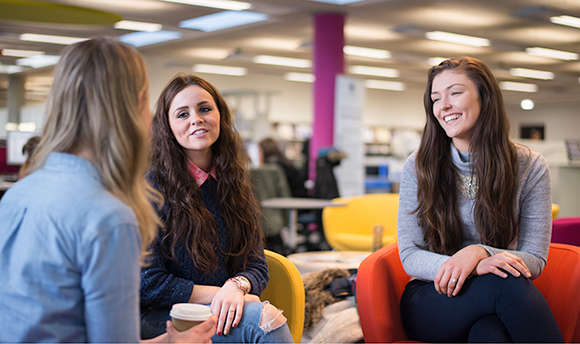 Group of students smiling and talking together, ϲ campus, Edinburgh