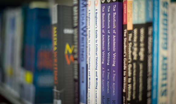 Close up of a row of books in the ϲ library